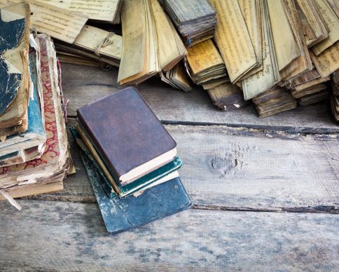 Vintage old books on wooden table