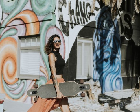 Cool woman with a longboard