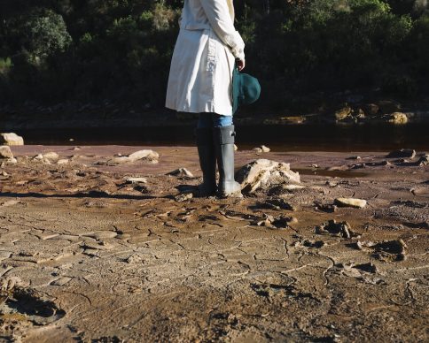 crop-woman-standing-rubber-boots