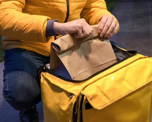 Delivery man in yellow jacket opening yellow backpack and taking a bag with order SSUCv3H4sIAAAAAAAACpyRwW7DIAyG75P2DhHnRkqXpGn6KtUOjqENKoEKSKep6rvPQKg4T8oh/mz/9m+enx9VxSZwEtmpeoaIYqnU6rwFL40m3Ow2boXmwpbkYdtDUwLBpTdWgirhBB5nDYsgqFelAn7FJHMe/OqEC9M3hODFlTQSfEukFc8prnIiJqmDUoztCubWKbKMkvi/OtPPd3YDV6HxNy5cGLFCCUhGzqmU3X68sEtpDVYuTeHqYRBUKGgLpbuVKPW1aDN+jmfPbWhW7W1Y4b05U8bcYVLhxBfSFJnP4ByV88yLQUiPbJZijjY+GthUGaeXCOG+/erb7jDS1/b9MPbHrSC93ixJJ66ThSjGm+SldRk2YMPIp170vOb7y6HueHOsxw67ukMYkLcccejo8K8/AAAA//8DAHPdwBCYAgAA