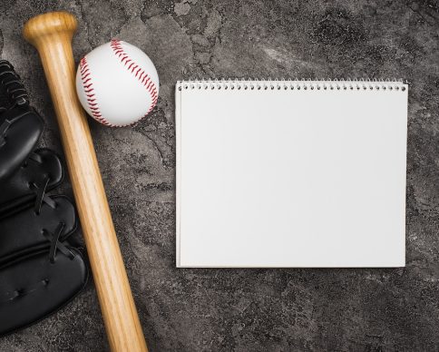 flat-lay-notebook-baseball-equipment