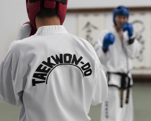 front-view-people-practicing-taekwondo