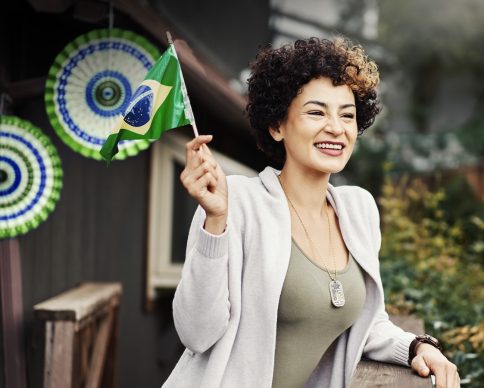 medium-shot-smiley-woman-holding-flag