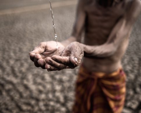 Elderly men are exposed to rainwater in dry weather,global warming,selective focus
