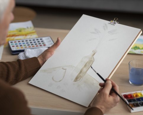 senior-watercolorist-studio-painting-with-watercolor