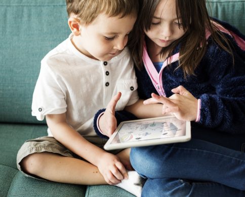 Sister Brother Playing Techie Digital Device