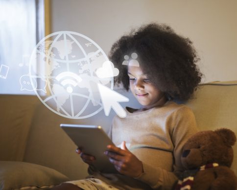 Young black girl using a digital tablet