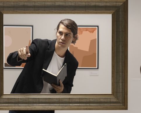 young-man-going-art-gallery